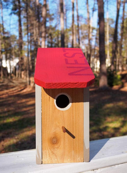 red NEST cedar birdhouse