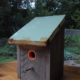 cypress birdhouse with reclaimed tin roof