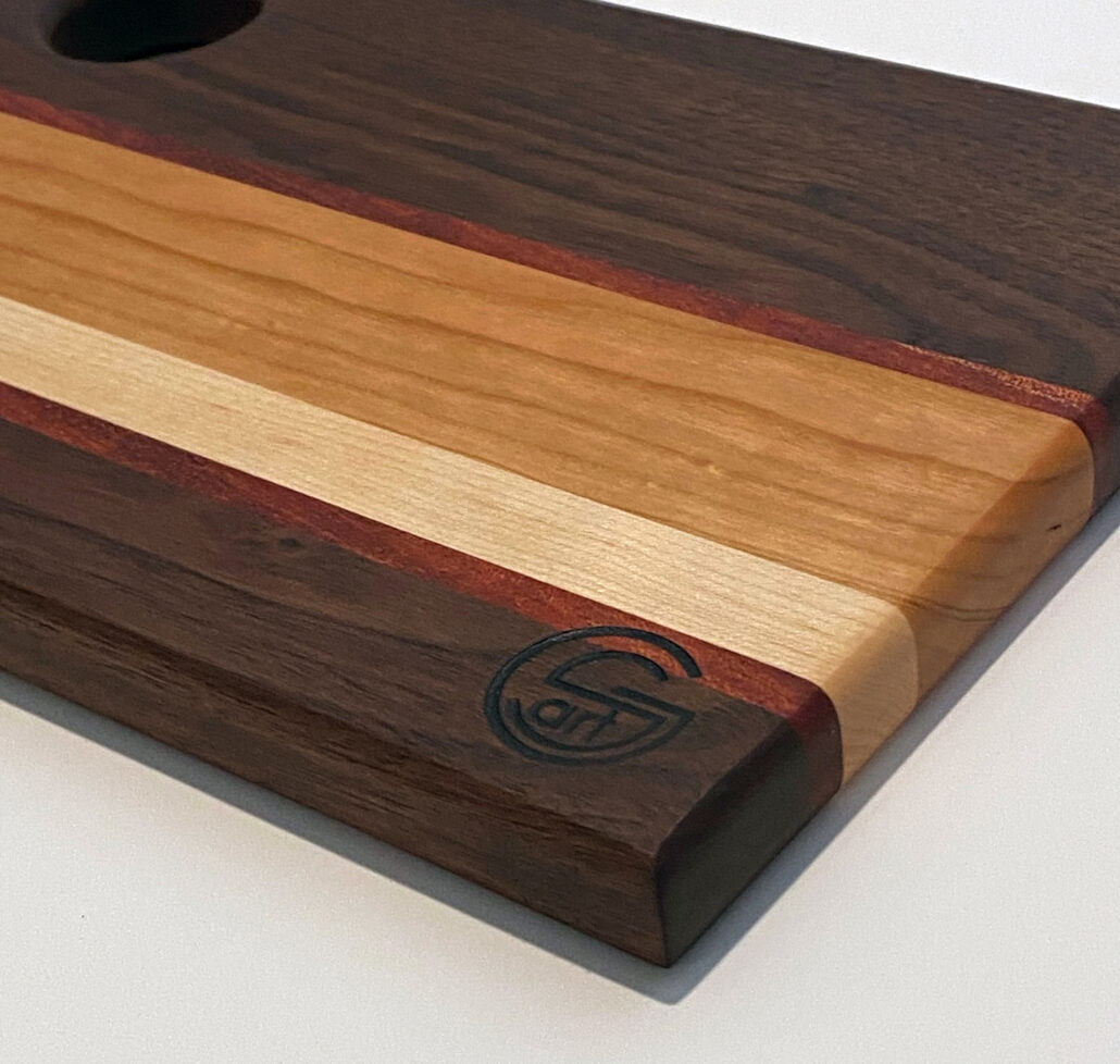 10in x 7in walnut, oak, maple and mahogany cutting board