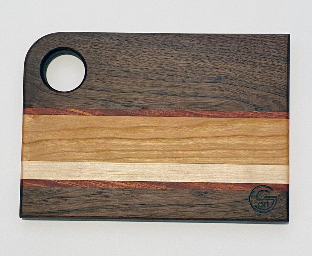 10in x 7in walnut, oak, maple and mahogany cutting board